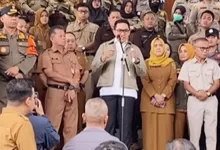 demo pedagang Pasar Pagi